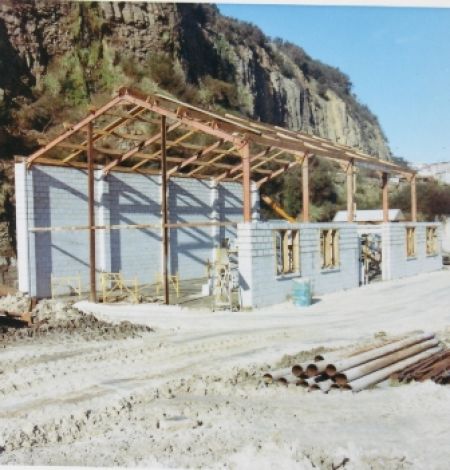 The construction of the first workshop building at Stone Street yard. The steel framework came from the Waipori gorge power project.  